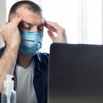 Stressed man with mask